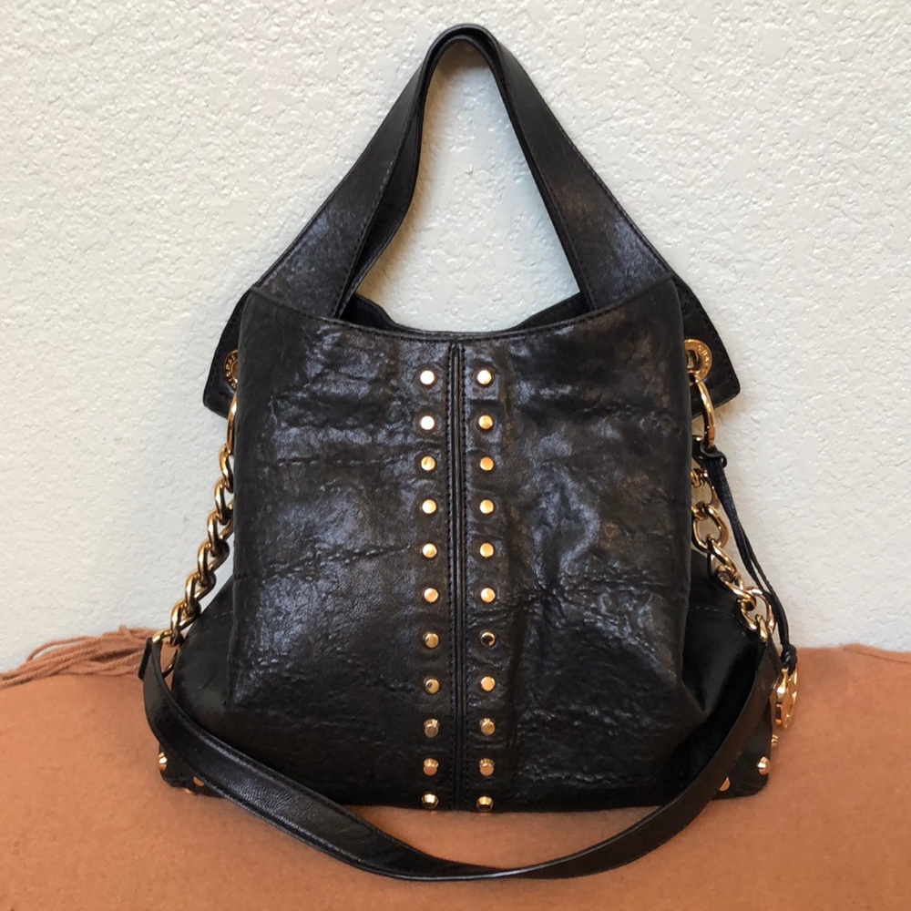 MICHAEL KORS LEATHER HOBO BAG.